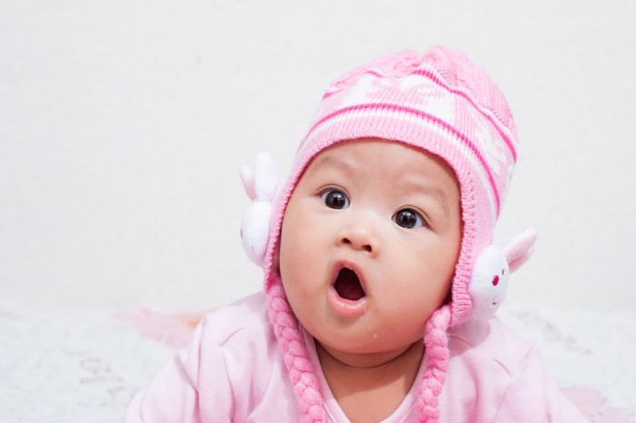 Shocked Baby in a Pink Hat