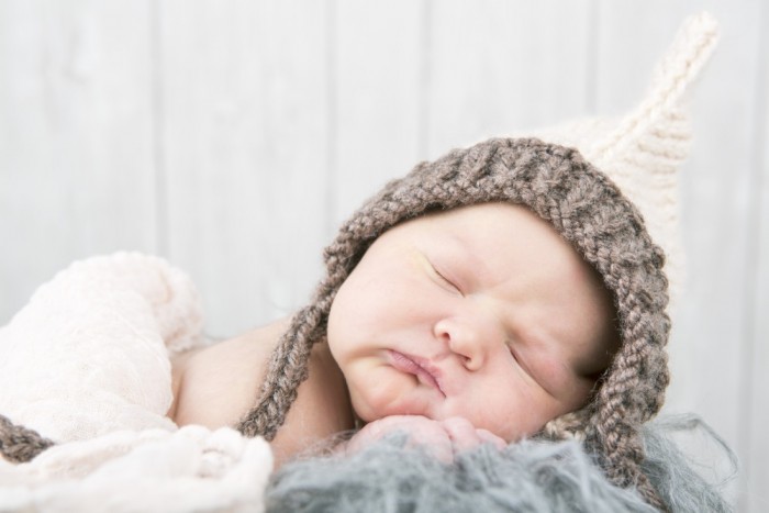 Warm, Sleepy Baby with a Cute Hat